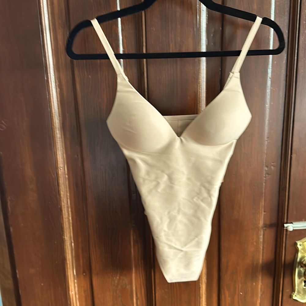 Skims super push-up thong bodysuit. Color: clay. Size XS